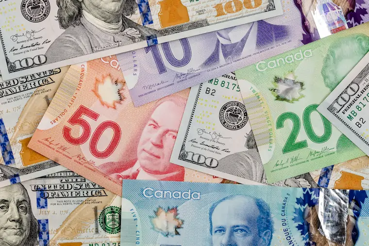Is it better to exchange money in U.S. or Canada feature image
